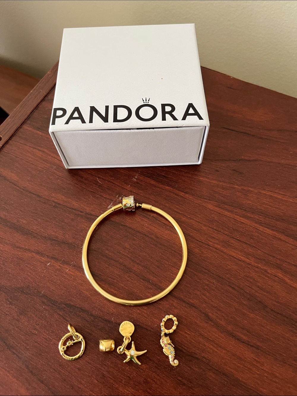 Pandora Gold Bracelet with Five Gold Charms